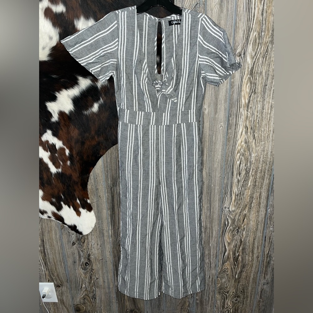 Crystal Sky gray and white striped cutout jumpsuit NWOT